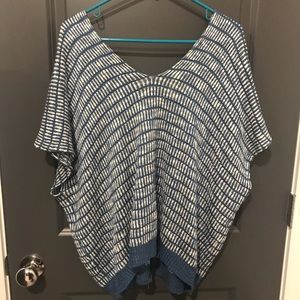 Super cute top with zipper detail down the back.